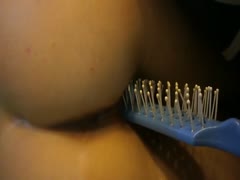 Comb got used as a dildo by insertion whore